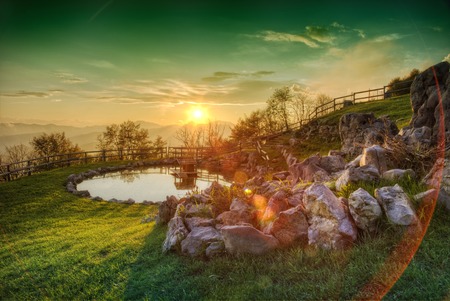 A sunset on a mountain lakeの写真素材