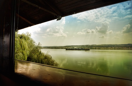 a window on Danubio riverの写真素材