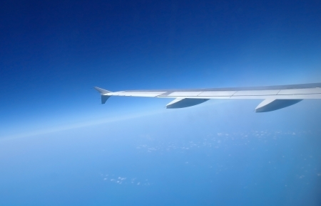 clouds and blue sky seen from plane の写真素材