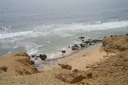 Beautiful azure red sea with waves and rocks and clear blue sky in Egypt.の素材 [FY310147026547]