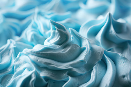 Close up of blue whipped cream texture for background and design.の素材