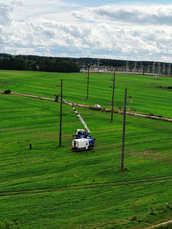 Aerial work platform truck repairing power lines.の写真素材