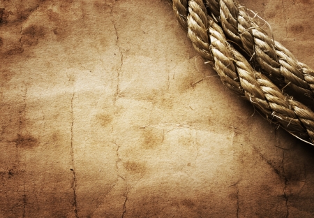 aged Rope on the old paper backgroundの写真素材
