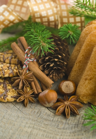 Christmas cakes on brown wooden background  selective focus の写真素材