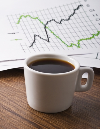 Worktable covered with documentsの写真素材