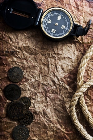 old compass and rope on grunge backgroundの写真素材