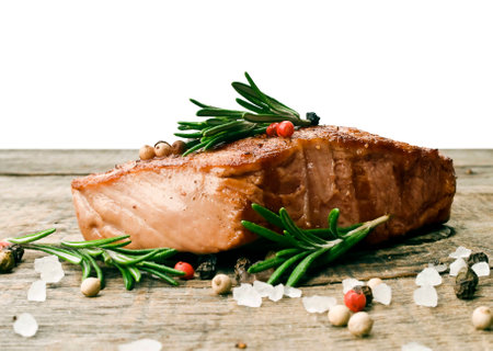 Beef steak on a wooden table の写真素材