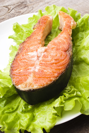 salmon steak with vegetablesの写真素材