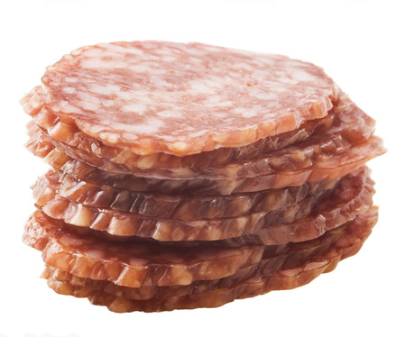 slices of salami isolated on a white backgroundの写真素材
