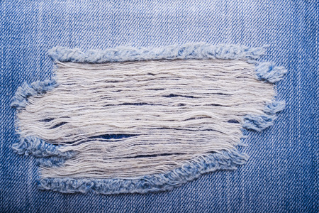 Texture of blue jeans textile close upの写真素材