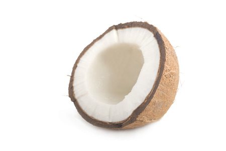 coconut cut in half on white backgroundの写真素材