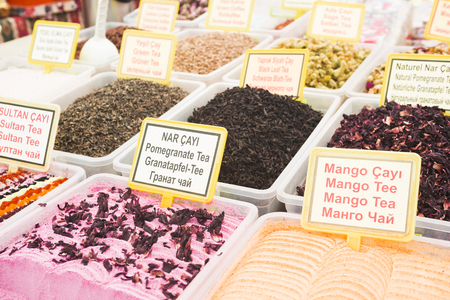 The name of each variety of tea is written on the tablets in four languages: Turkish, English, German and Russian / Turkish national tea and coffee (selective focus).のeditorial素材