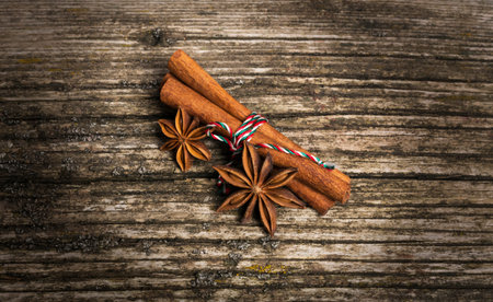 Star anise with cinnamon at christmas time over old wood