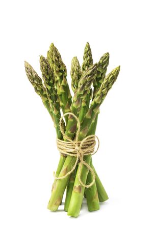 fresh green asparagus on a white backgroundの写真素材