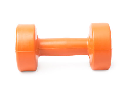 Orange dumbbell on a whiteの写真素材