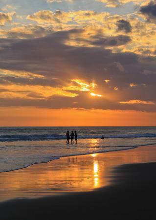 Magic Dramatic Unreal Sunset in Kuta beach, Bali, Indonesiaの写真素材
