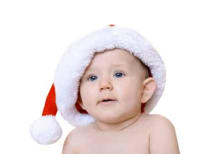 Christmas baby boy in red capの写真素材