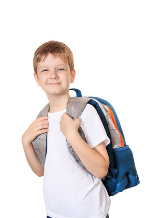 Schoolboy with bag isolated on white background.の写真素材