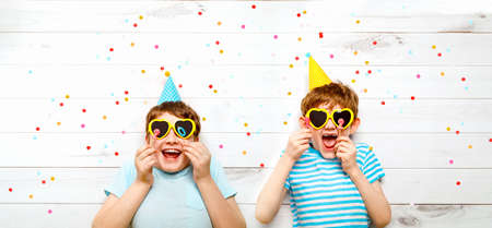 Happy friends celebrating 2022 new year. Holiday concept.の写真素材