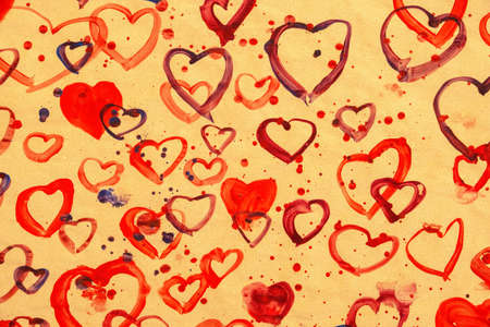 many red hearts for mother's day as a thank you, watercolor hand painted hearts pattern on orange, brown paper as love, wedding, birthday, valentines day background decorationの写真素材
