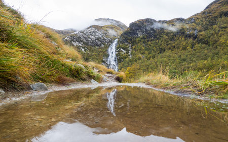 Reflection of the Steall Falls in Glen Nevis, Scotland