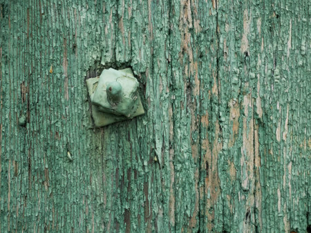 wooden surface with old paint peeling off