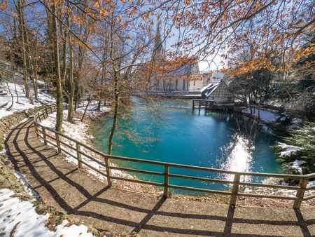 view on the well "Blautopf" in Blaubeuren, Germanyの写真素材