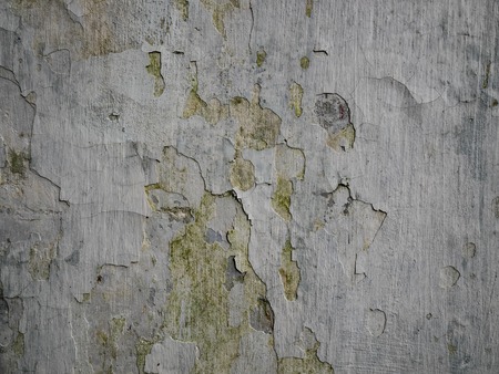 wall surface with old paint peeling offの写真素材
