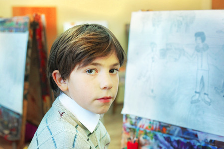 handsome preteen boy at the art school lessonの写真素材