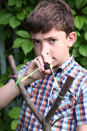 boy with    turnpike aiming to the targetの写真素材