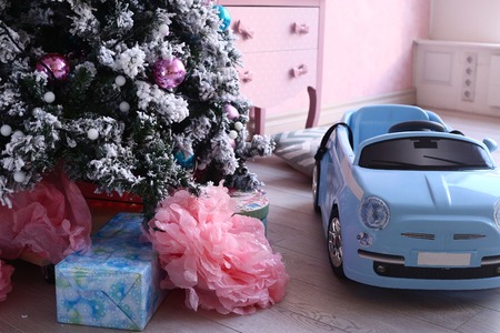 christmas tree with decoration on the pink room backgroundの写真素材