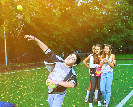 MOSCOW, RUSSIA, SEPTEMBER 13, 2016: Unidentified school kids on outdoor sport throwing ball competition in school yard in Moscow, September 13, 2016のeditorial素材