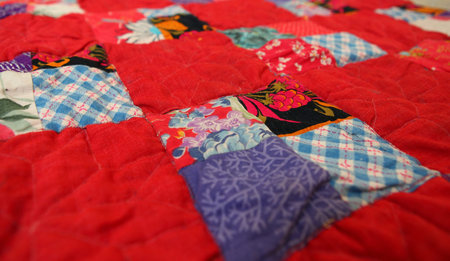 patchwork quilt in the village interior close up