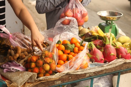 tangerin dragon fruit rambutan mango fruit on marketの写真素材