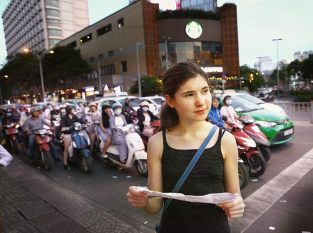 foreigner stranger girl in Ho Chi Mihn city with mapのeditorial素材