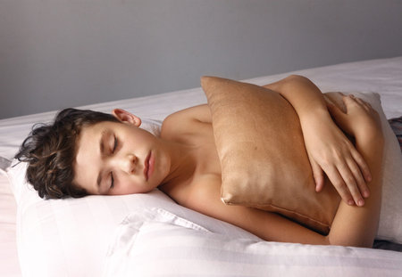 teenager boy sleep on siestaの写真素材