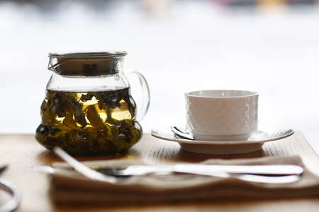 Chinese tea milk oolong served in tea pot closeup photo on the tableの写真素材