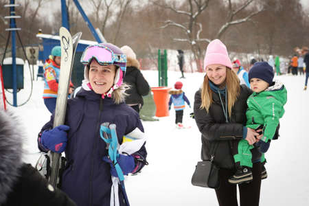 Alpine skiing master class for kids with instructor in winter sports school for children.のeditorial素材