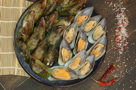 green mussel clam in shell closeup photo