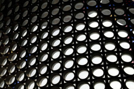 A modern architectural interior with a circular shaped skylightの写真素材