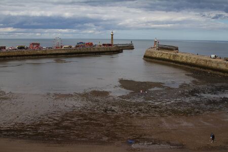 Whitby Pier and Harbour in Englandの写真素材