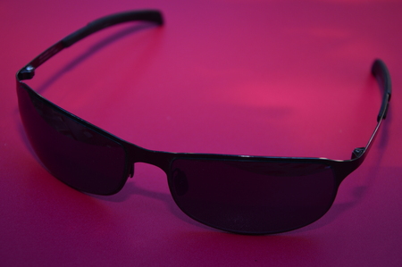 Sun glass on magenta backgroundの写真素材