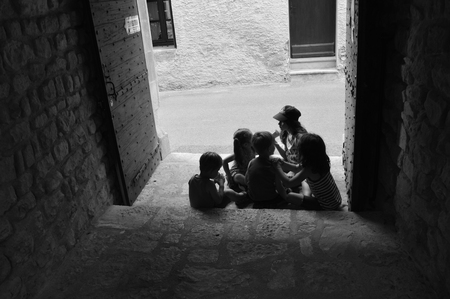 Children playing at the entranceのeditorial素材