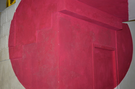 A red circle on a wallの写真素材