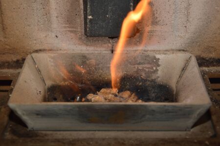 Wood pellets in the fireの写真素材