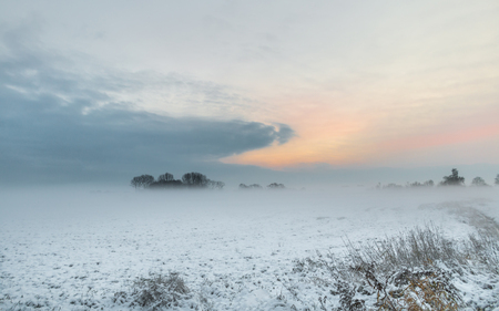 Sunrise in winter in Teufelsmoor near Bremenの写真素材