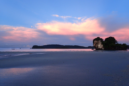 Pink sunrise on the beachの写真素材