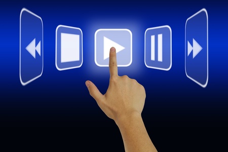 Hand pressing play buttonの写真素材