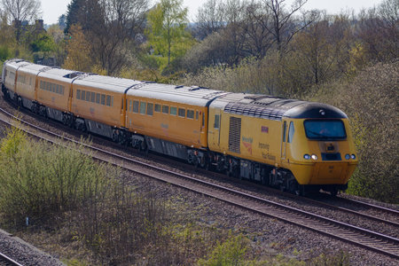 Willington. Derbyshire, UK, April,23,2021: The Network Rail Measurement Train approached North Stafford Junction returning to its home in Derby United Kingdom.  This is a converted Passenger High Speed Diesel Train.のeditorial素材