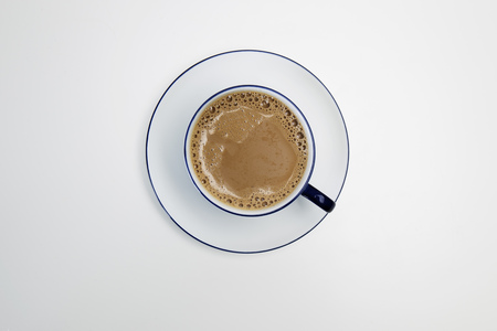 Cup of coffee on white tableの写真素材